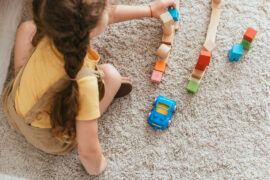 child-playing-on-carpet