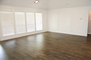 Unoccupied room with beautiful new LVP flooring.